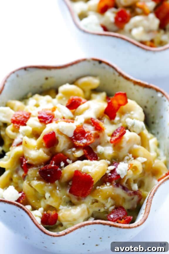 Close-up of creamy Blue Cheese Bacon Macaroni and Cheese, showcasing rich texture.