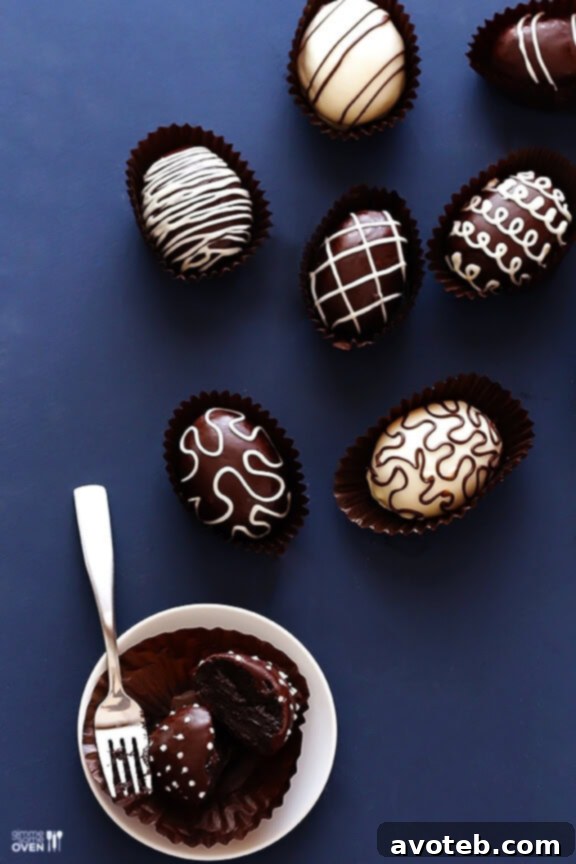 Close-up of beautifully decorated Easter Egg Oreo Truffles, showcasing the two-toned chocolate design.