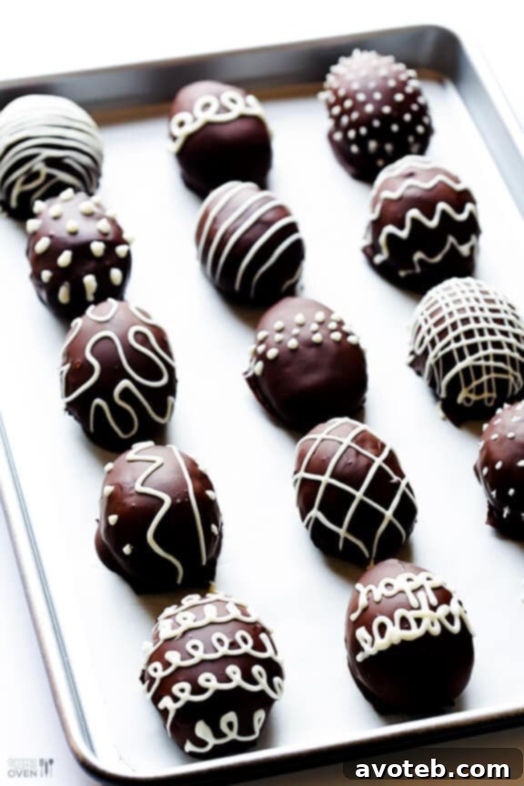 Close-up of a beautifully finished Easter Egg Oreo Truffle, highlighting the perfect chocolate coating and drizzle.