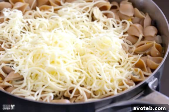 Shredded cheese ready to be added to the macaroni
