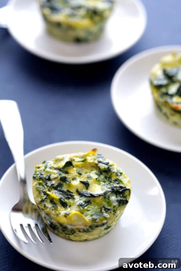 A Batch of Freshly Baked Spinach Artichoke Quiche Cups