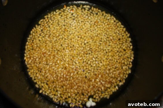 Popcorn kernels prepped and ready for cooking, showcasing the simple ingredients.