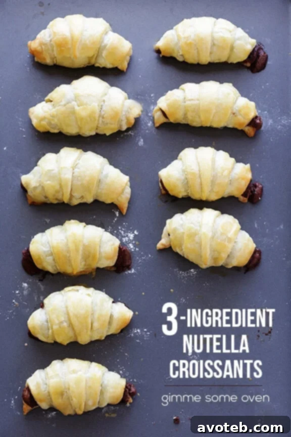 A close-up shot of a perfectly baked Nutella Croissant with flaky layers