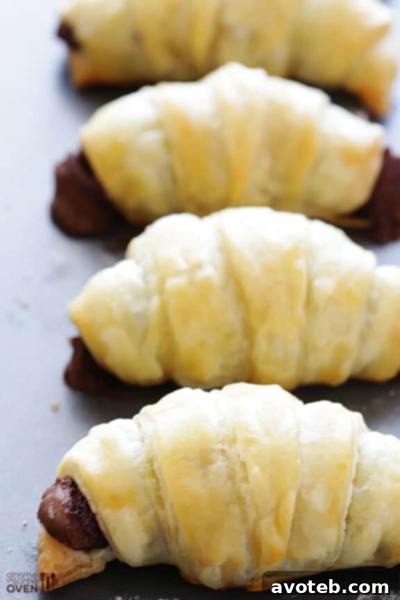 Essential ingredients for Nutella Croissants: Nutella, puff pastry, and egg