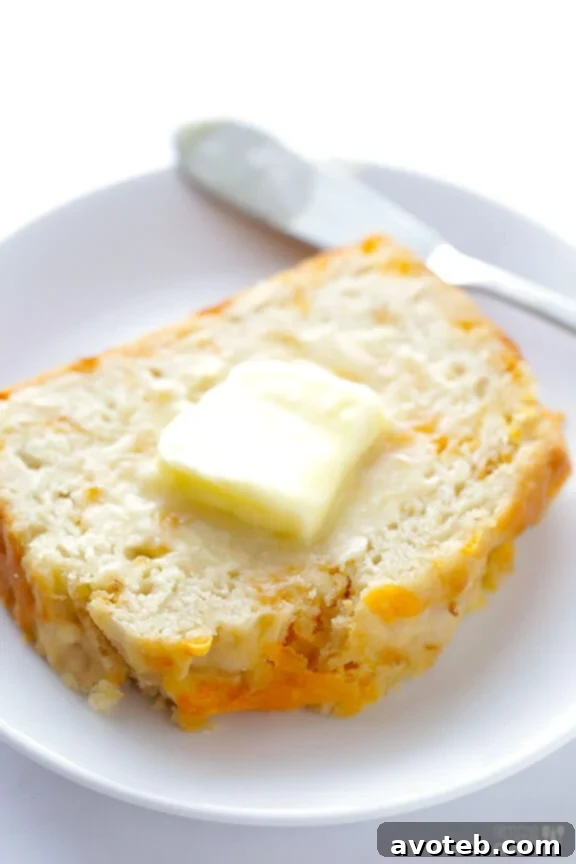 Garlic Cheddar Beer Bread, a versatile side for summer meals.