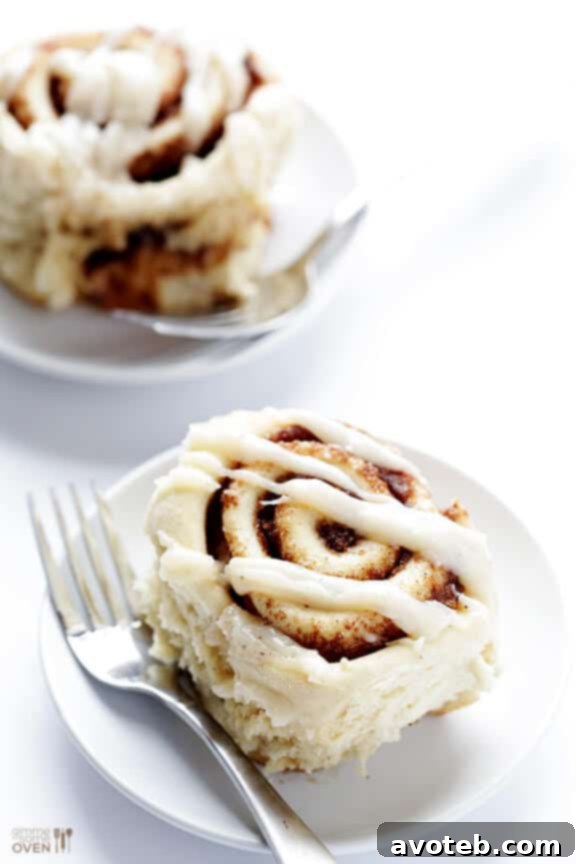 Close-up of a bite of Brown Butter Cinnamon Roll.