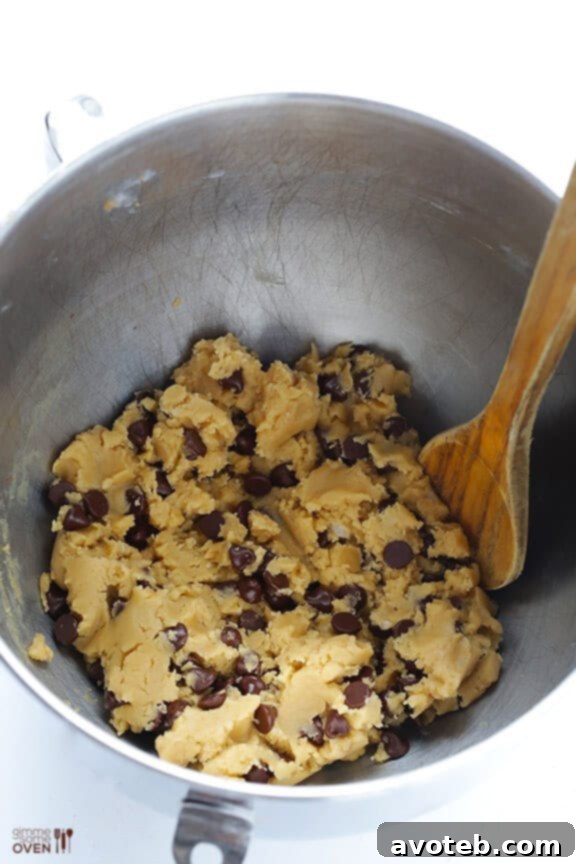 Mixing cookie dough with coconut oil
