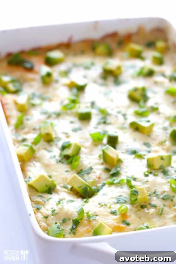 Creamy White Chicken Enchilada Casserole with a lighter sauce.