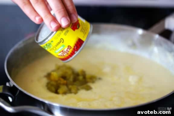 Close-up of the creamy green chile sauce for White Chicken Enchiladas.