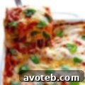 A slice of delicious Spinach Lasagna on a plate.