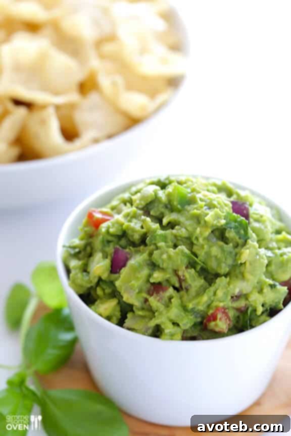 Italian Guacamole -- fresh basil is the rockstar of this delicious twist on classic guacamole | gimmesomeoven.com #appetizer #dip #glutenfree #vegan