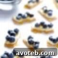 Easy Blueberry Cheesecake Bites Recipe Card Image