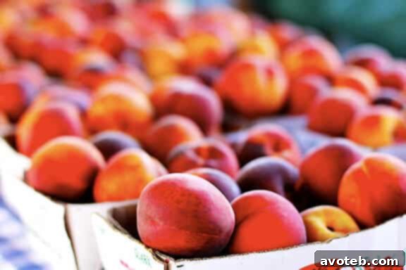 A vibrant selection of fresh produce in a grocery store aisle.