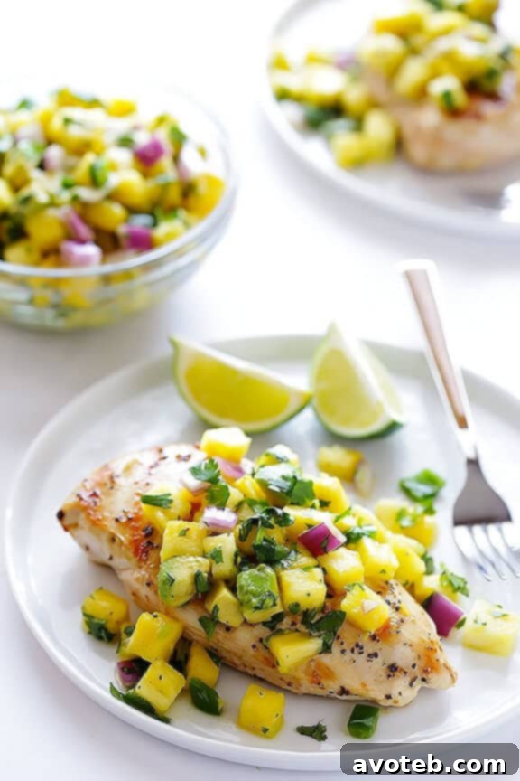 Grilled Chicken with Pineapple Avocado Salsa Freshly Prepared Pineapple Avocado Salsa atop Grilled Chicken