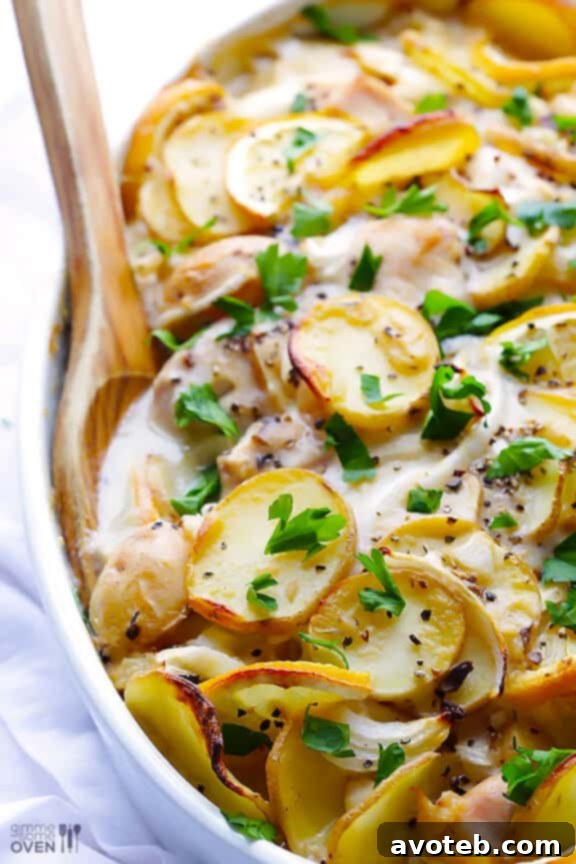 Savory Lemon Chicken Potato Casserole with roasted vegetables.
