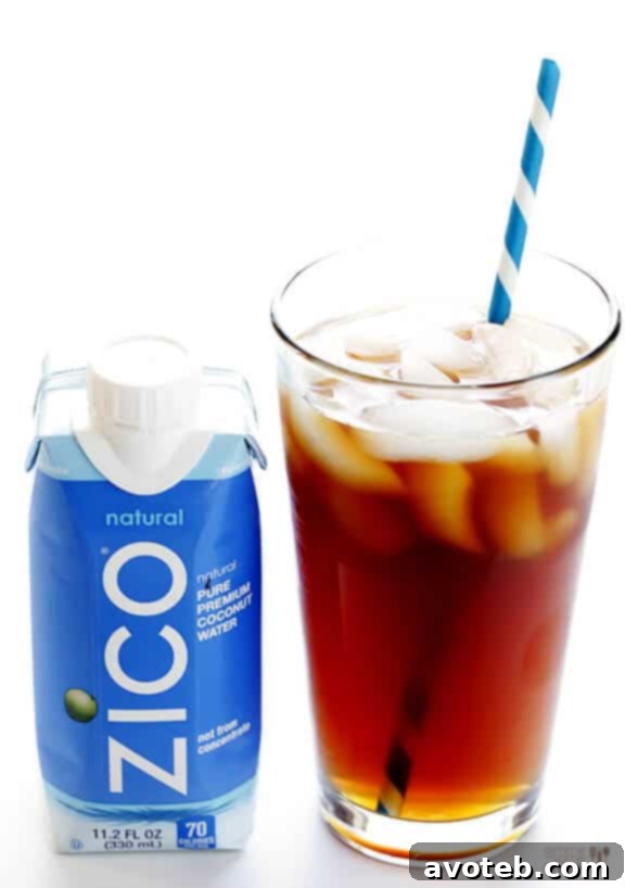 Simple ingredients for a hydrating cold brew coffee Ingredients for Coconut Water Iced Coffee laid out: a glass of ZICO coconut water, a glass of cold brew coffee concentrate, and ice cubes. Emphasizes simple, natural ingredients.