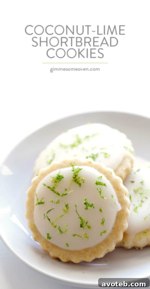 Tropical Coconut Lime Shortbread 9 A final photo of a large batch of Coconut Lime Shortbread Cookies, beautifully glazed and garnished, arranged on a cooling rack.