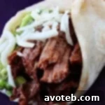 Slow Cooker Shredded Beef Tacos