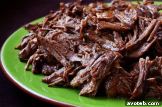 Delicious Slow-Cooker Shredded Beef Tacos, ready to serve