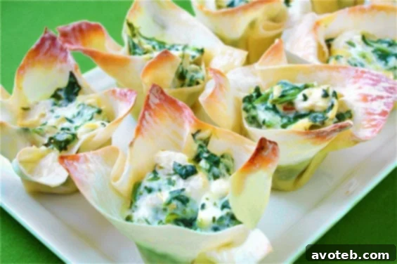 Delicious Spinach and Artichoke Cups arranged on a platter, ready to serve as a party appetizer.