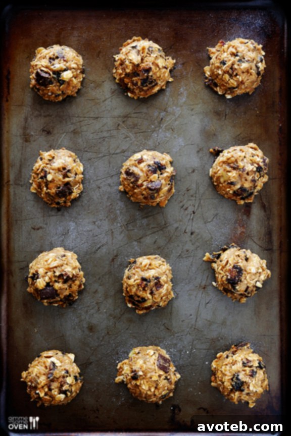 Cookie dough scooped onto a baking sheet