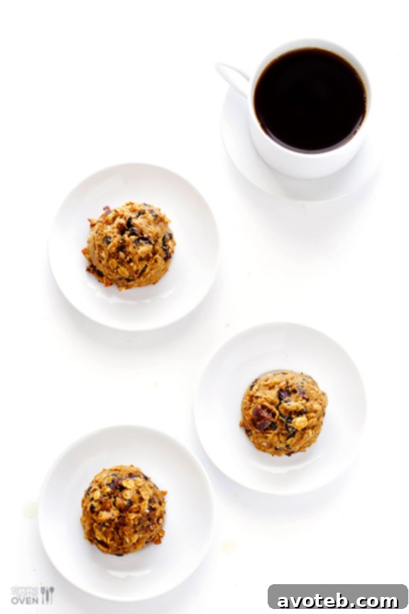 Hand holding a warm, soft breakfast cookie
