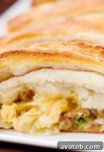 Easy Breakfast Braid, a savory pastry filled with eggs, sausage, and cheese