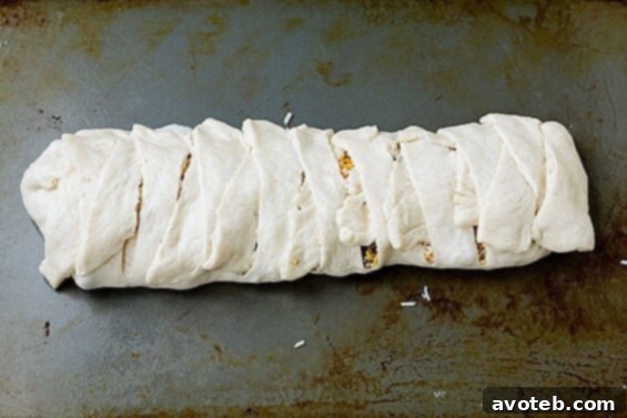 Sliced Easy Breakfast Braid revealing savory filling