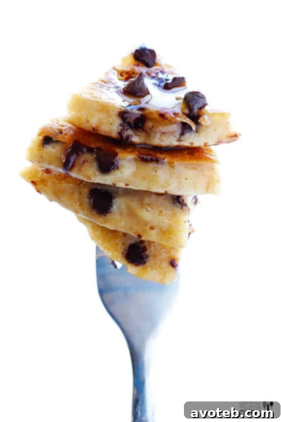 Indulge in Guilt-Free Chocolate Chip Pancakes Plus a Cookbook Giveaway 6 A stack of golden Guiltless Chocolate Chip Pancakes topped with syrup and chocolate chips