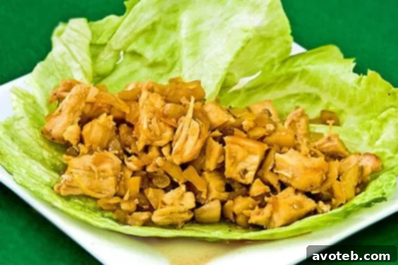 Homemade Chicken Lettuce Wraps with a delicious savory and sweet pouring sauce, inspired by PF Chang's