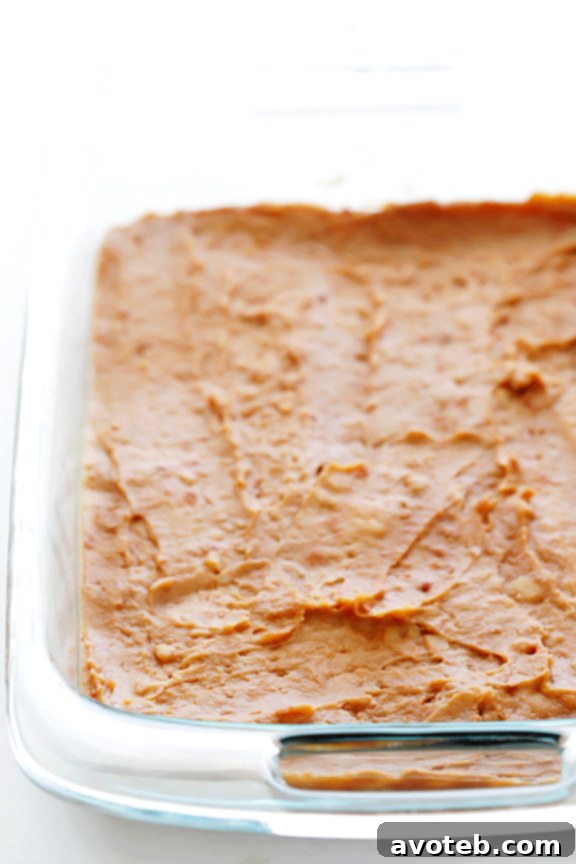 Close-up of the fresh and colorful layers of the 7 Layer Dip, ready to be served.
