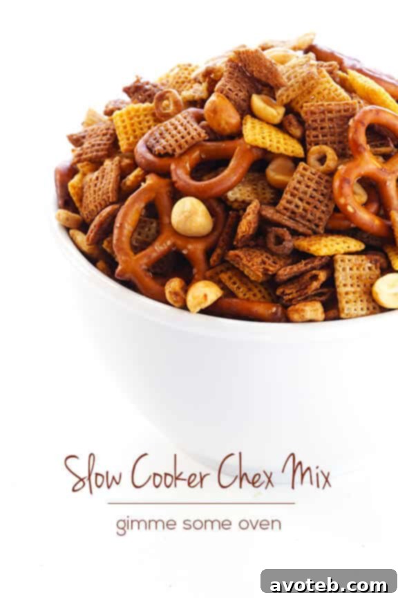 Effortless Slow Cooker Party Mix 11 A bowl of freshly made Slow Cooker Chex Mix.