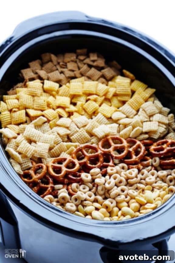 Effortless Slow Cooker Party Mix 4 Classic Chex Mix ingredients ready for the slow cooker.