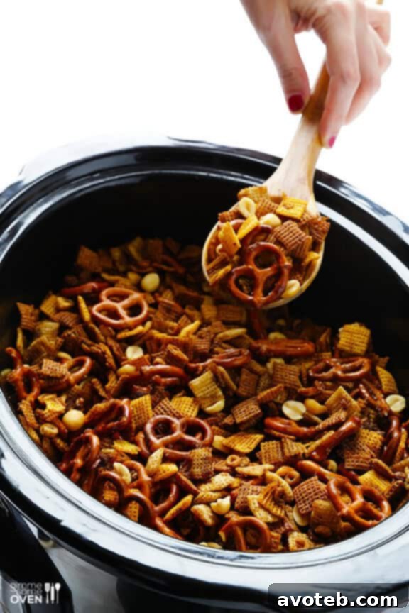 Effortless Slow Cooker Party Mix 7 Finished Slow Cooker Chex Mix, golden and crispy.