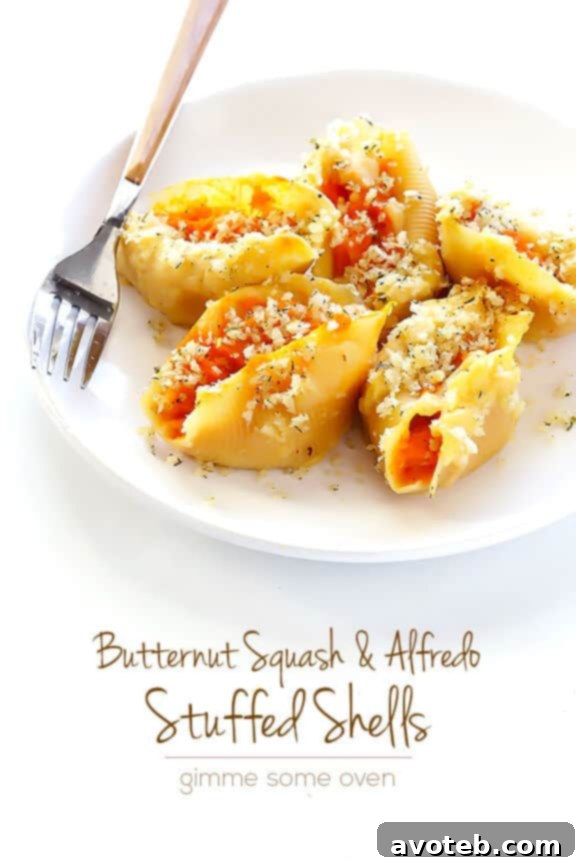 Velvety Butternut Alfredo Stuffed Shells 10 Butternut Squash Alfredo Stuffed Shells, garnished with fresh herbs, ready to eat.