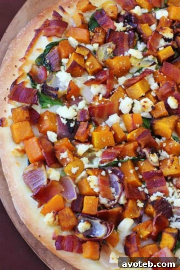 Butternut, Bacon, Spinach and Feta Pizza | gimmesomeoven.com - a hearty and nutritious fall pizza with earthy butternut squash, savory bacon, and tangy feta.