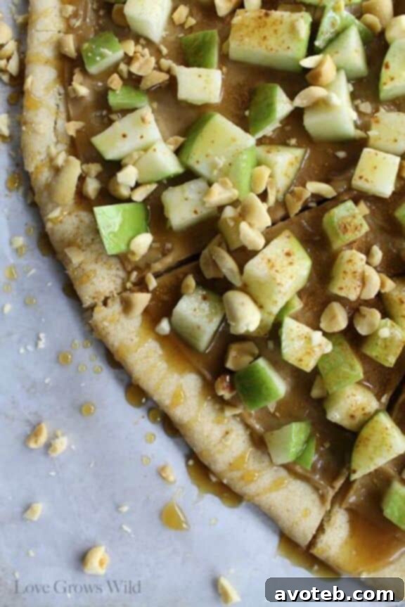 Taffy Apple Pizza | lovegrowswild.com - a delightful dessert pizza reminiscent of a classic fall treat.