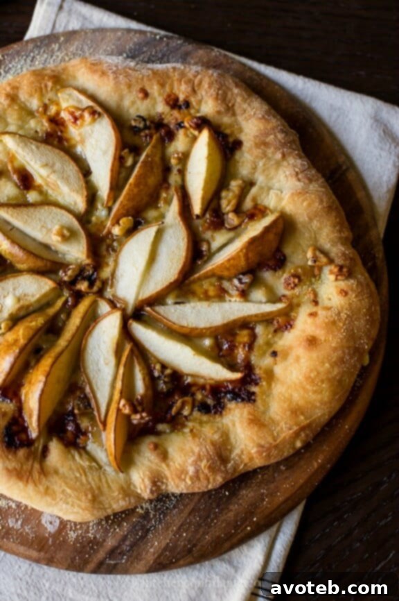 Pear & Walnut Gorgonzola Pizza | kitchenconfidante.com - an elegant and rich fall pizza with sweet pears, crunchy walnuts, and pungent gorgonzola.