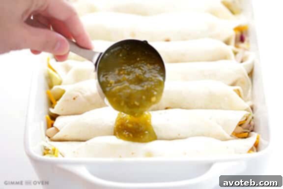 Turkey Enchiladas Recipe | Layering salsa verde and cheese