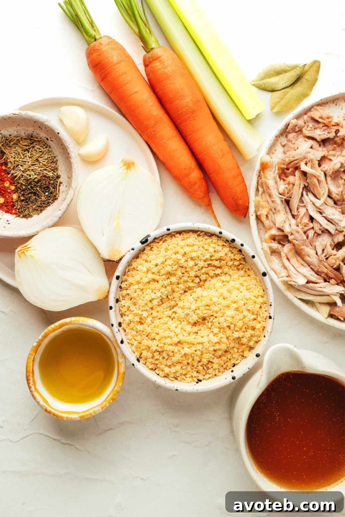 Twinkle Star Chicken Noodle Soup 3 Close-up of fresh, vibrant ingredients for Chicken and Stars Soup including carrots, celery, and onions.