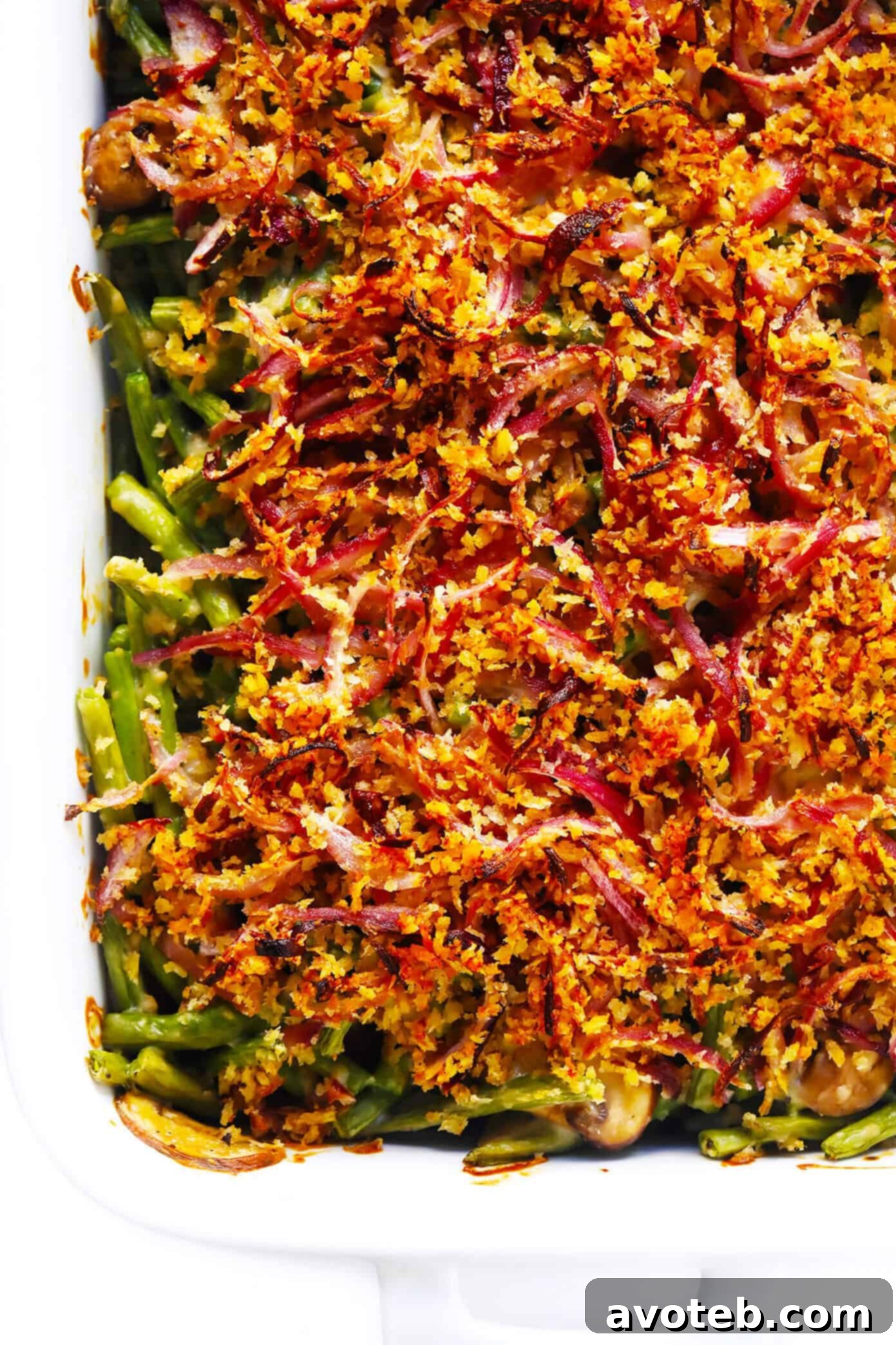 This BEST green bean casserole recipe -- made 100% from scratch with a crispy onion topping and creamy Parmesan mushroom green bean filling. So fresh and flavorful, and always the perfect side dish for Thanksgiving! | gimmesomeoven.com Easy Green Bean Casserole Recipe Ready for Baking