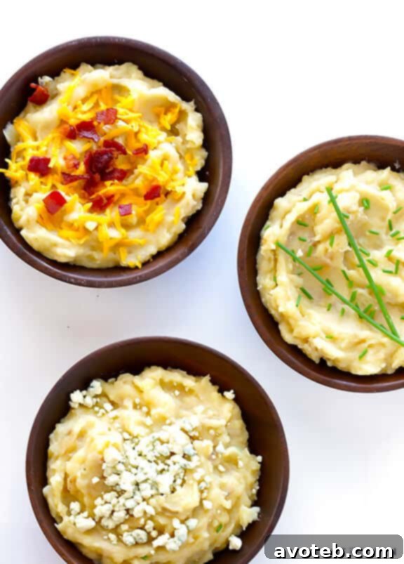 Close-up shot of a fork digging into creamy slow cooker mashed potatoes.