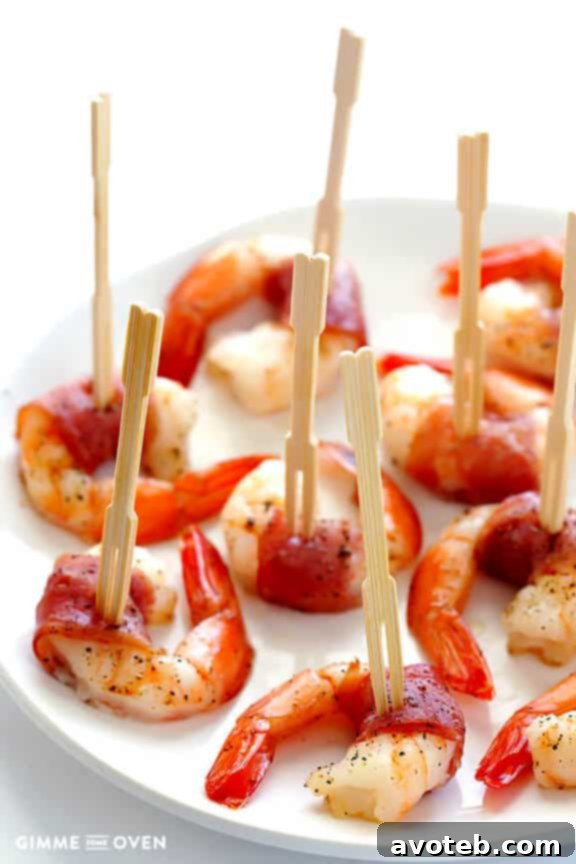 Effortless Prosciutto-Wrapped Prawns 2 Delicious Easy Prosciutto Wrapped Shrimp on a platter, ready to serve