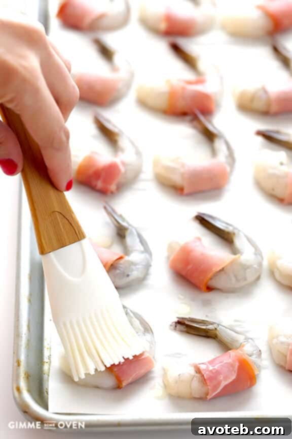 Effortless Prosciutto-Wrapped Prawns 5 Pre-baked prosciutto-wrapped shrimp brushed with butter and seasoning