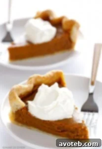 Delicious Bourbon Pumpkin Pie with a flaky crust, ready for Thanksgiving