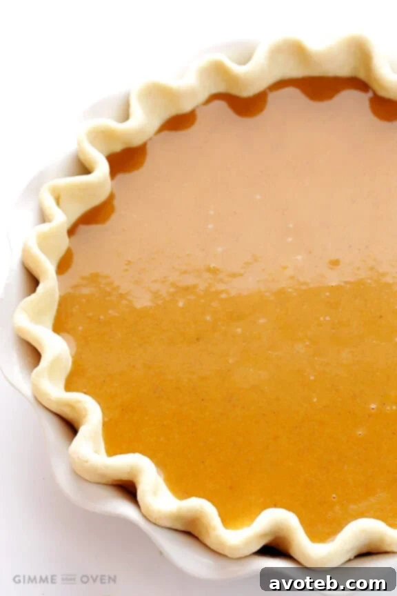 Bourbon Pumpkin Pie baking in the oven