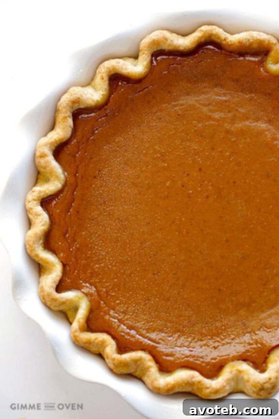 Cooling rack with a freshly baked Bourbon Pumpkin Pie