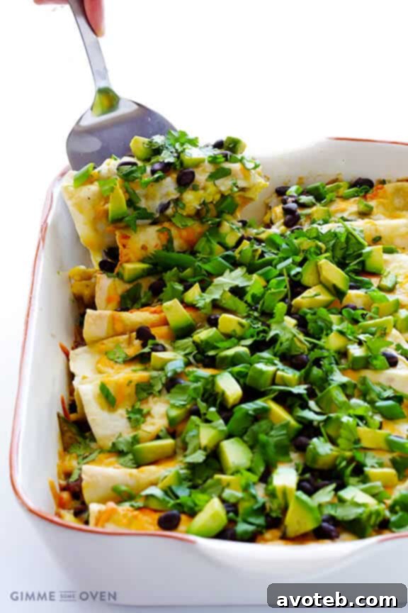 Sunrise Enchilada Bake 2 Savory Breakfast Enchiladas: Your Morning Meal Revolutionized with Sausage, Eggs, Cheese, and Avocado
