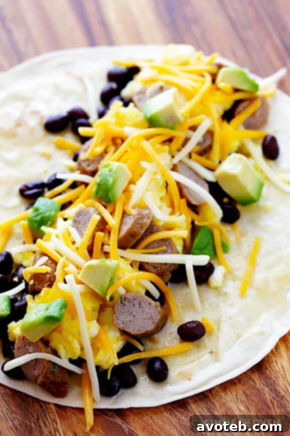 Sunrise Enchilada Bake 4 Hearty Breakfast Enchilada Recipe with Sausage, Eggs, Black Beans, and Avocado