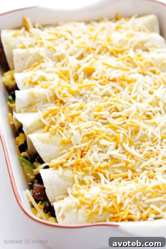 Sunrise Enchilada Bake 5 Golden Brown Breakfast Enchiladas Topped with Extra Cheese and Baked to Perfection